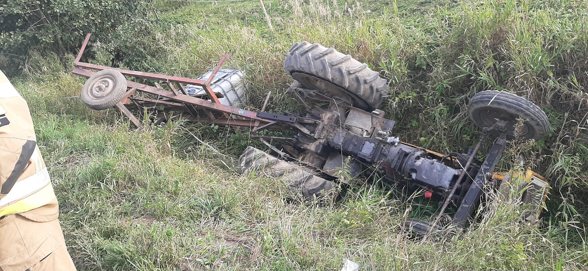 The 12-year-old got into the tractor.  The machine crushed the boy