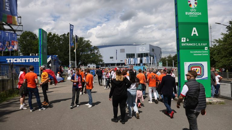 An armed man attacked fans before the Poland-Netherlands match.  Shots were fired